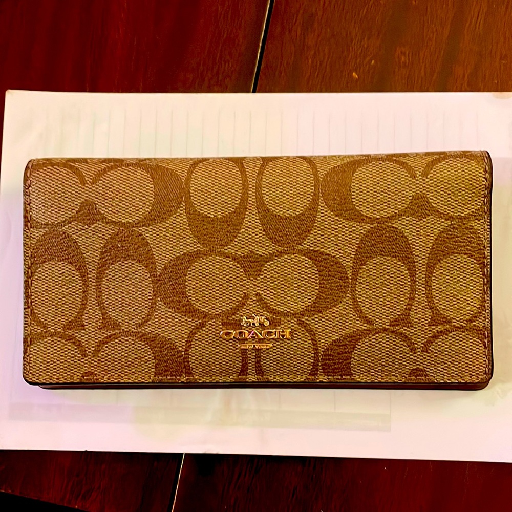 Coach checkbook cover